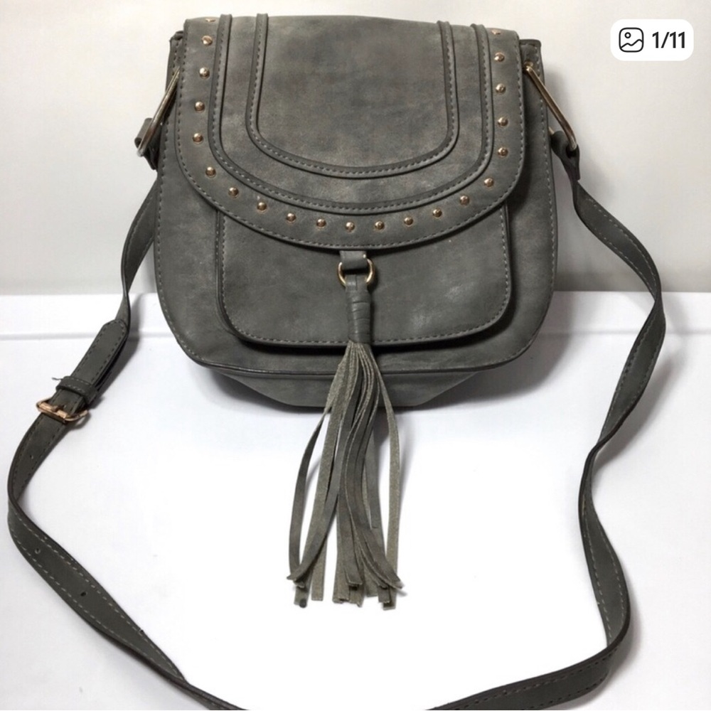 Franco Sarto tassel studded crossbody bag.